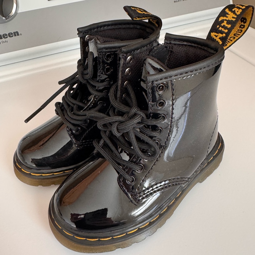Dr. Martens Shiny Black Boots with Yellow Stitching